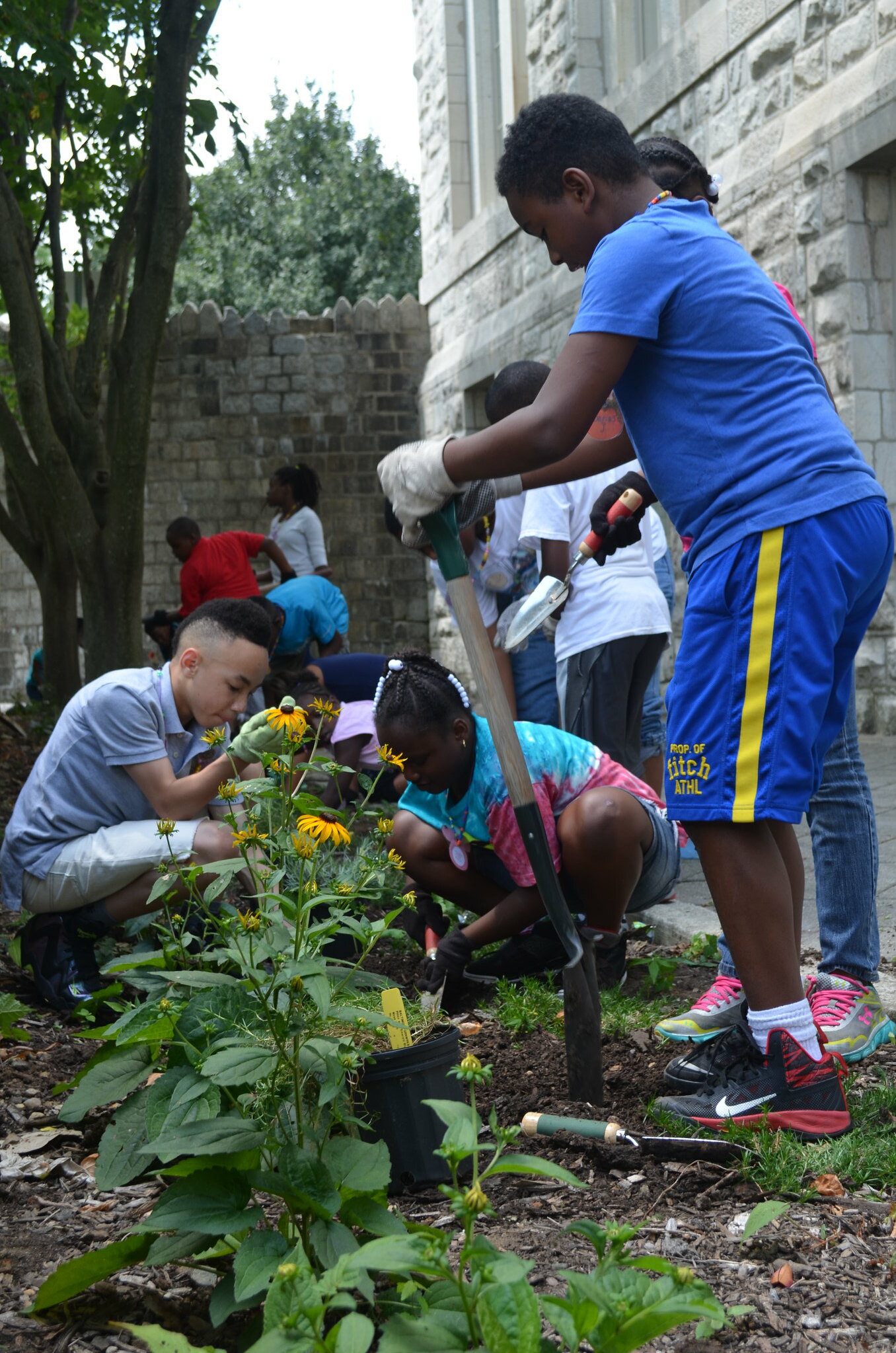 Kids gardening in Baltimore City