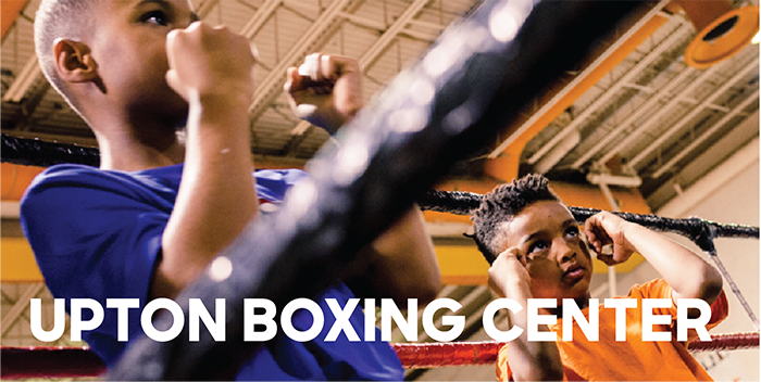 Photo of people in a boxing ring