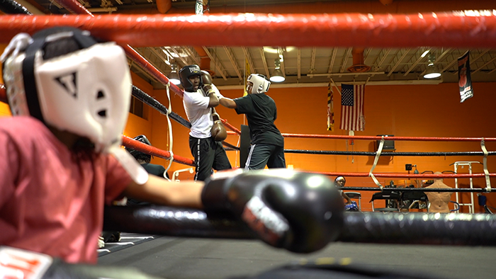 People in a boxing ring