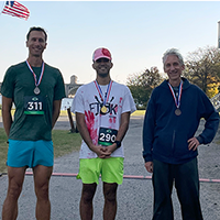 Zombie $5 5K men's division winners; from left Max, Dylan and Louis